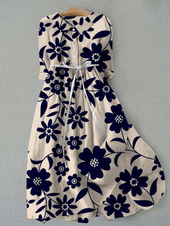 Selma – Strandklänning med blommor och band i midjan